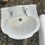 Toilet and cistern , sink and taps Image 3