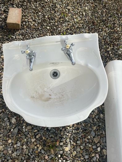 Toilet and cistern , sink and taps