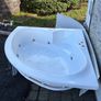Corner jacuzzi bath Image 2