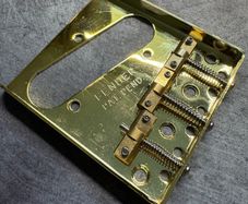 Fender Vintage Telecaster Bridge - Gold with Brass Compensated Saddles