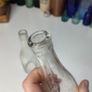 219 - Set of 2 Vintage Clear Glass Decorative Collectible Bottles Image 7