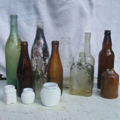 A small lot of vintage glass bottles (free to collect)