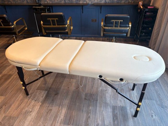 Massage table