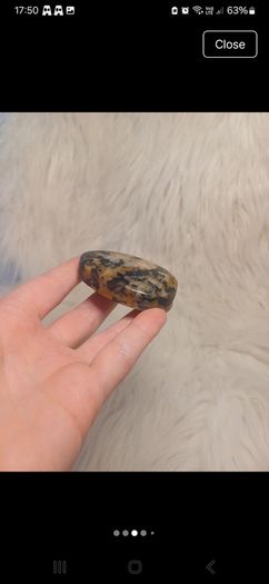 black and yellow tourmaline in quartz palmstone