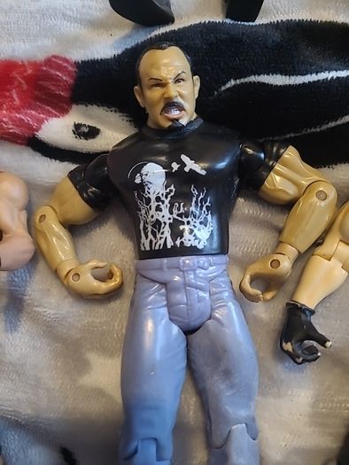 13 WWE wrestling figures
