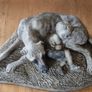 Sculpture of a boy sleeping with a dog Image 5