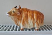 Porcelain cow or yak figurine