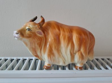 Porcelain cow or yak figurine
