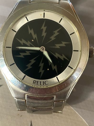 Relic face changing watch with broken watchstrap