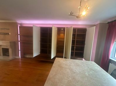 wall unit, made to fit a sitting room, in mint condition, fit with lights and glass doors, need gone asap