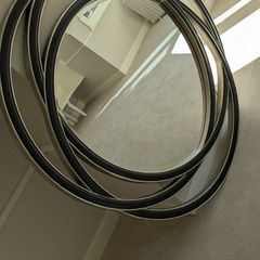 Modern circular interlocking ring mirror