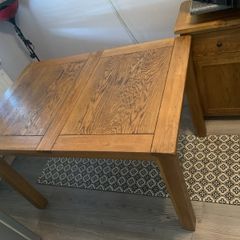 free table with extension piece and four chairs