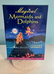 Magical mermaids and dolphins