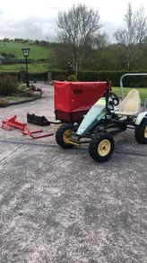 Berg tractor with implements