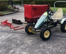 Berg tractor with implements