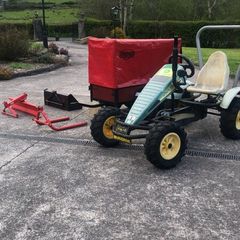 Berg tractor with implements