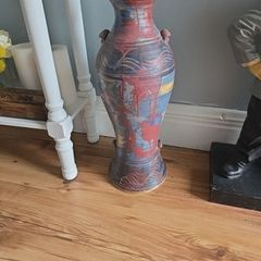 15 pieces of Michael Kennedy pottery. Mixed pieces and sizes. Great condition.