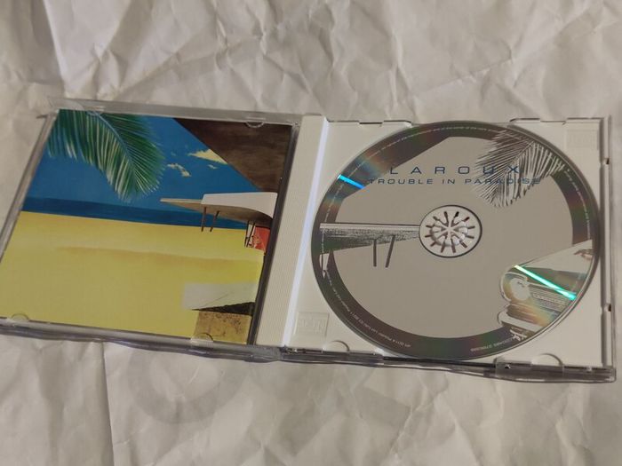 Laroux - Trouble In Paradise Cd