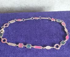 Beautiful necklace with multi-colored enamel.