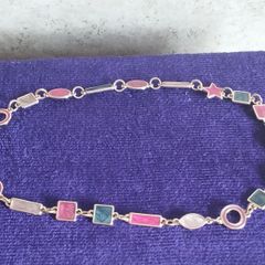 Beautiful necklace with multi-colored enamel.