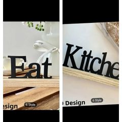 Small kitchen and eat signs on stand didn't suit