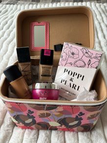 makeup box and used half and 3/4 full various make ups see pictures Nars / Mac/ wet-n-wild/0lay, perfume poppi and pearl and makeup box