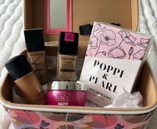 makeup box and used half and 3/4 full various make ups see pictures Nars / Mac/ wet-n-wild/0lay, perfume poppi and pearl and makeup box