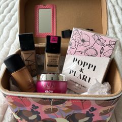 makeup box and used half and 3/4 full various make ups see pictures Nars / Mac/ wet-n-wild/0lay, perfume poppi and pearl and makeup box