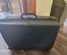 Vintage hardshell suitcase possibly Samsonite durable storage