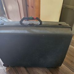 Vintage hardshell suitcase possibly Samsonite durable storage