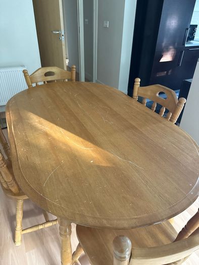 Sturdy wooden dining table and four chairs set