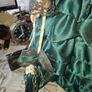 Vintage Large Victorian-style collectible Porcelain Doll featuring curly reddish-brown hair and a multi-layered emerald green satin and lace dress Image 3