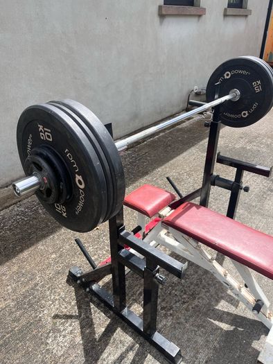 Gym equipment (squat rack/ bench / barbell + weights)