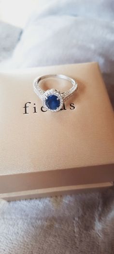 9 ct White Gold & Sapphire ring,size O. Cubic Zirconia