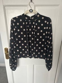 New. "One size" top from Born. (Will fit 8- 14)