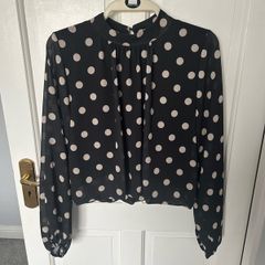 New. "One size" top from Born. (Will fit 8- 14)