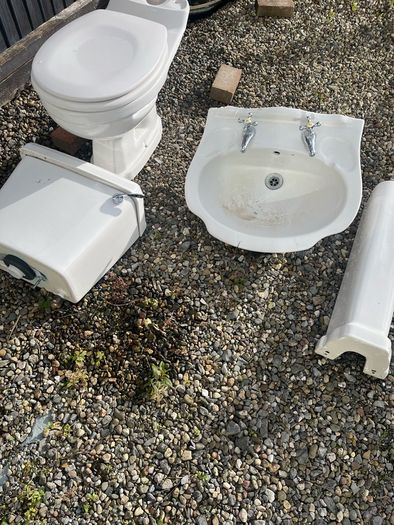 Toilet and cistern , sink and taps