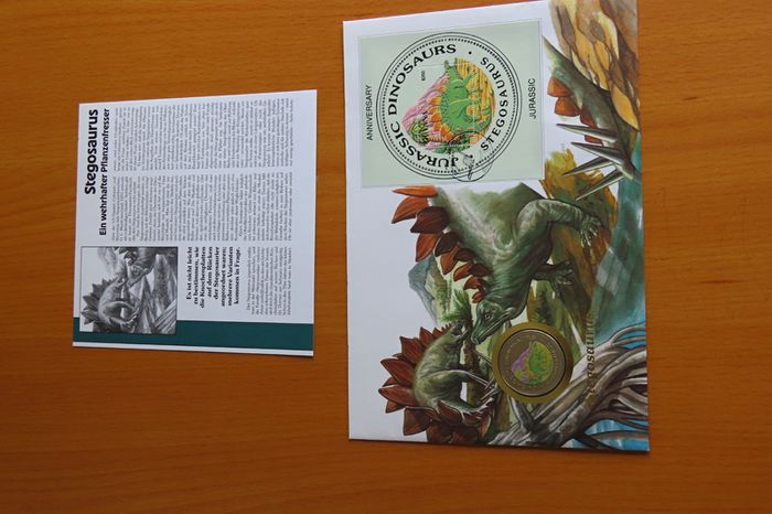 Rare Stegosaurus Dinosaur coin in vintage stamp cover