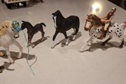 4 Schleich horses with 2 figures