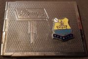 collectible vintage stamp holder and booklet inside
