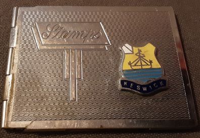 collectible vintage stamp holder and booklet inside