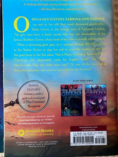 2 Children's Books . Suit 8/ 10  Plus . The Sisters Grimm & School for Skylarks.