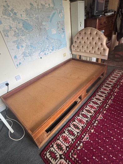 Wooden single bed with drawers