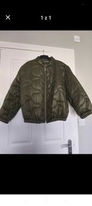 New coat one size fits up to Large