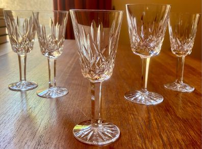 Four Waterford Crystal Lismore Sherry Glasses, One Lismore Small Wine Glass, 1970s.