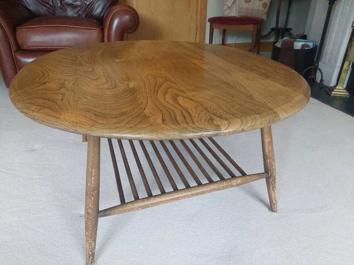 Vintage Ercol style oval coffee table with magazine rack