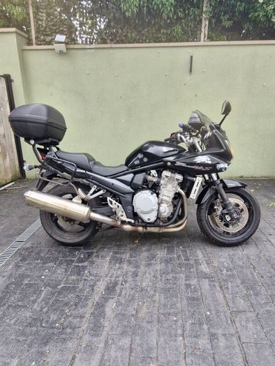 2007 black susuki bandit 1250 including luggage boxes .