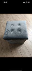 Grey velvet stool with storage
