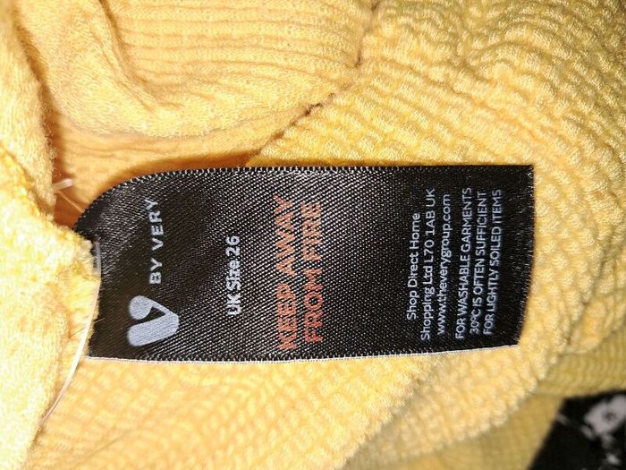 ladies yellow top size 26