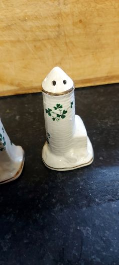 salt and pepper carrigaline pottery,cork Ireland shamrock set gold rim ,nice condition,buyer collects or pays postage thank you, sold as is